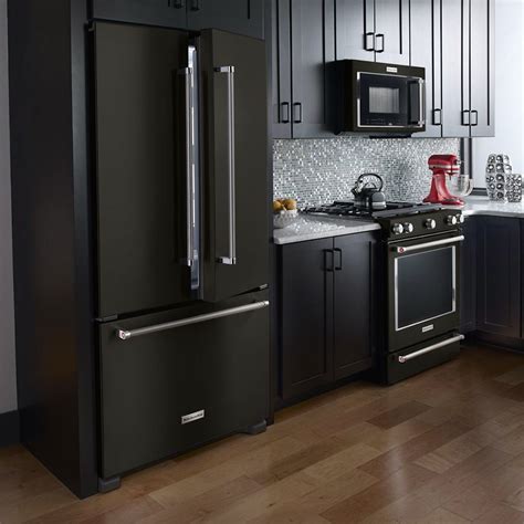 black cabinets with black steel fridge|black kitchen appliances.